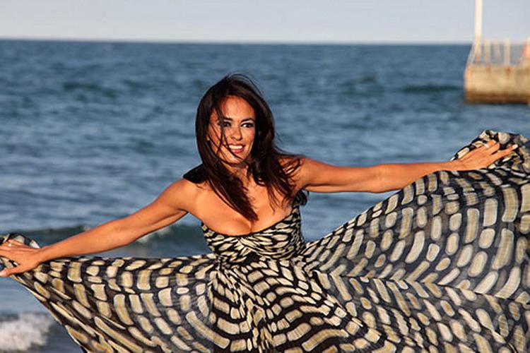 10P Maria Grazia Cucinotta looking very sexy and busty on some photoshoot