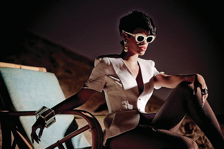 10P Rihanna exposing her nice big tits and posing topless for some photoshoot