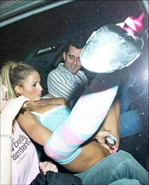 15P Katie Price Jordan masturbating with cell phone and showing her big tits