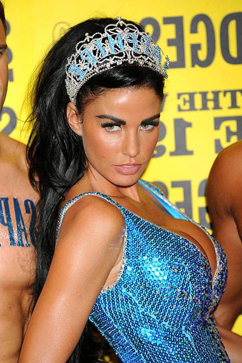 15P Katie Price Jordan masturbating with cell phone and showing her big tits