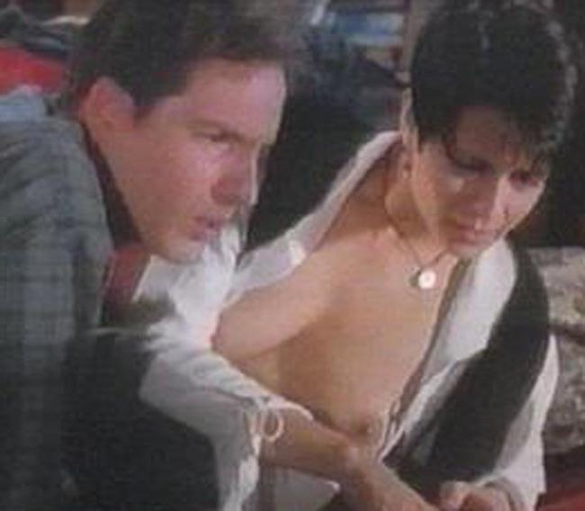 15P Catherine Bell showing her nude generous boobs