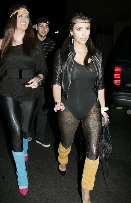 15P Kim Kardashian showing her big ass in tight dress
