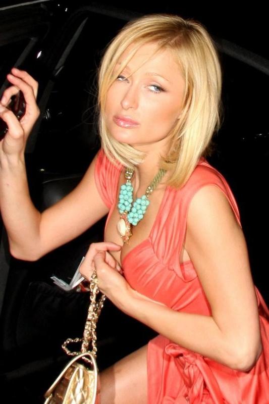 16P paris hilton caught by paparazzi in nipple slip action