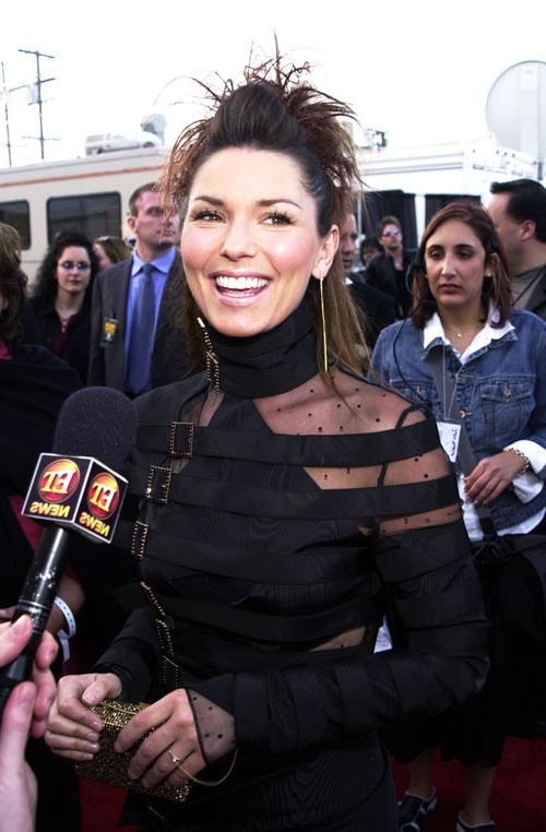 16P Shania Twain posing very sexy in fuckme boots and in see thru