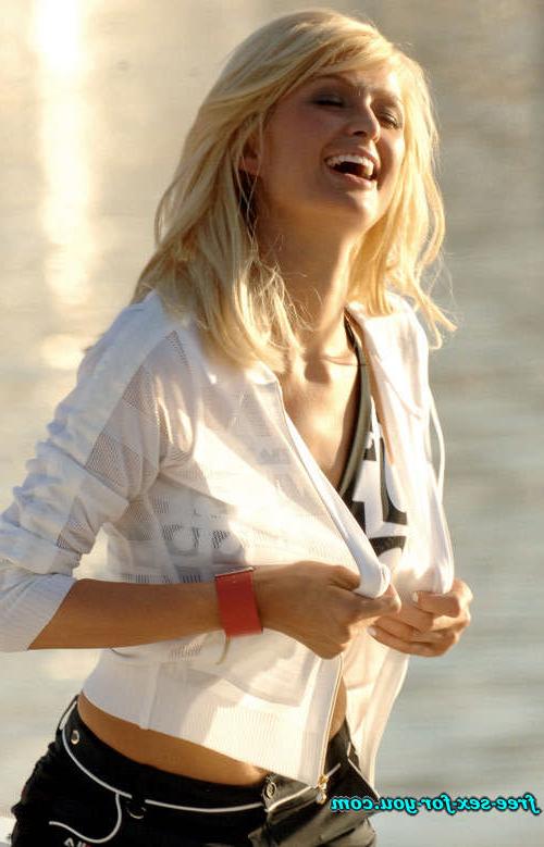 16P Paris Hilton showing her perky tits and nice pussy to paparazzi