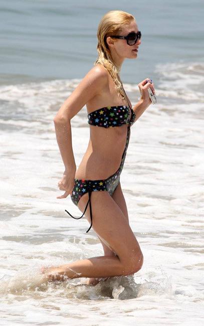 16P Celeb Paris Hilton paparazzi nude perky tits
