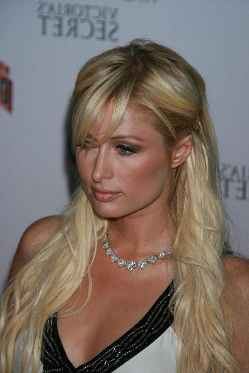 16P Paris Hilton showing her perky boobs and posing sexy in thong