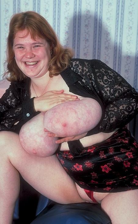 20P Plump babe loves to tease while playing with her huge tits