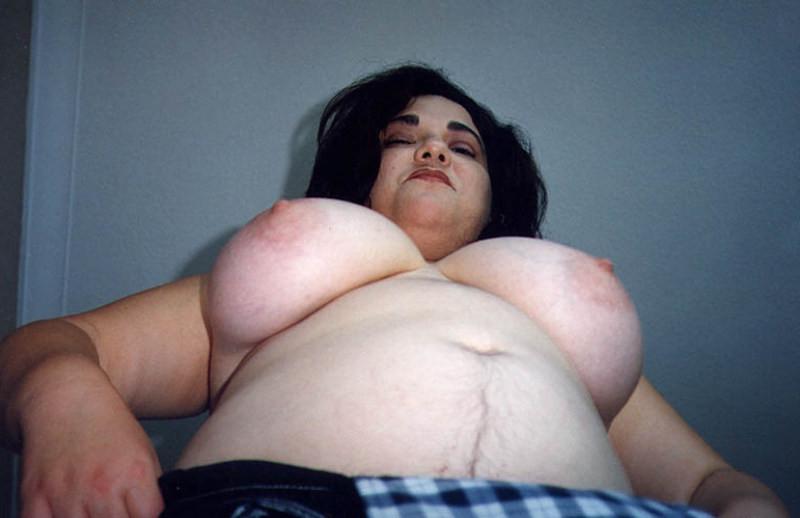 20P Plumper brunet with massive boobies
