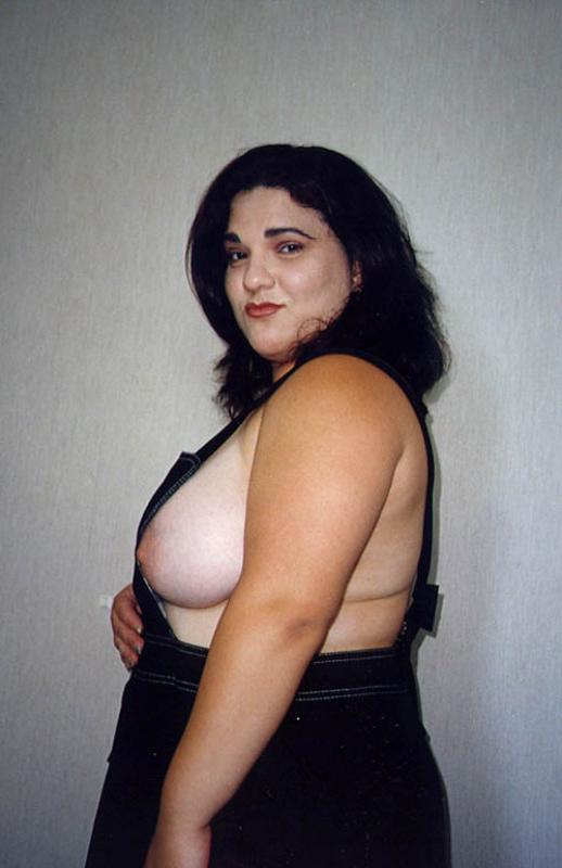 20P Plumper brunet with massive boobies