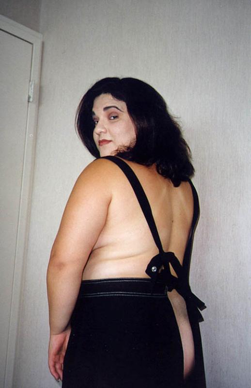 20P Plumper brunet with massive boobies