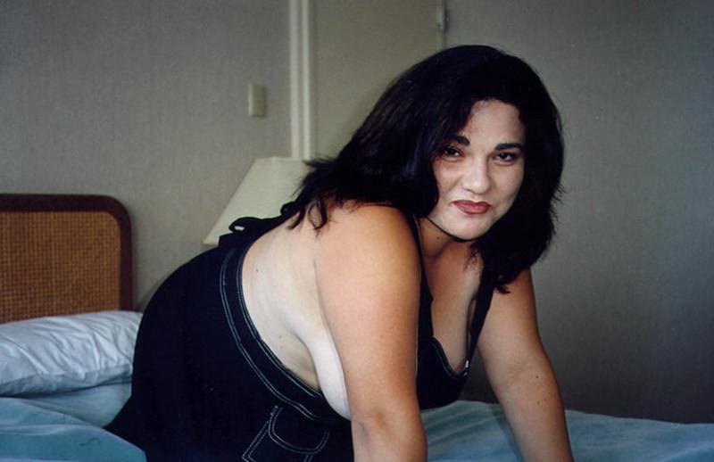 20P Plumper brunet with massive boobies