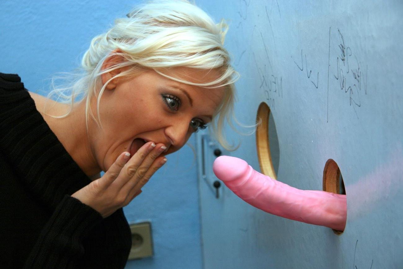 17P Cock hungry blonde sucks cock through hole in toilet wall