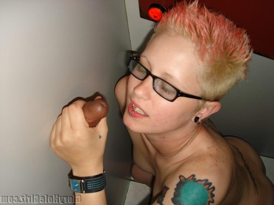19P A tattooed slut sucks off complete strangers at a gloryhole