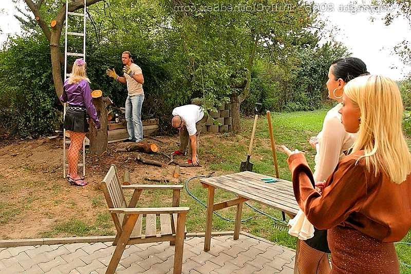 20P Group of clothed people having an orgy in the garden