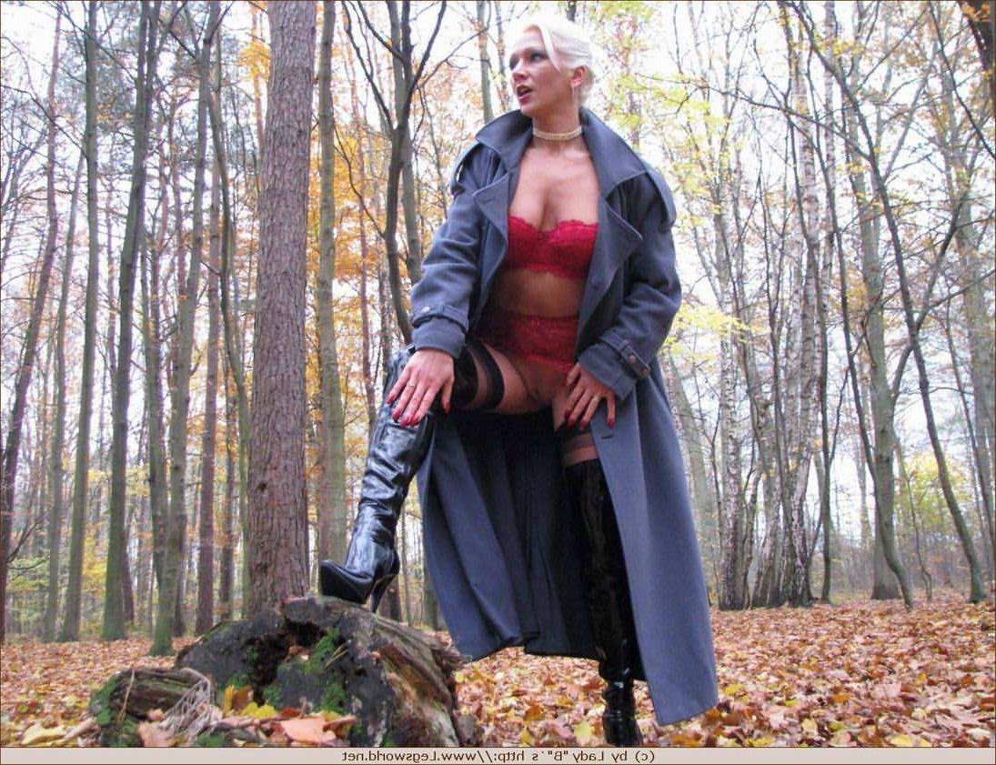 12P Blonde Ewa in stockings and high boots outdoors