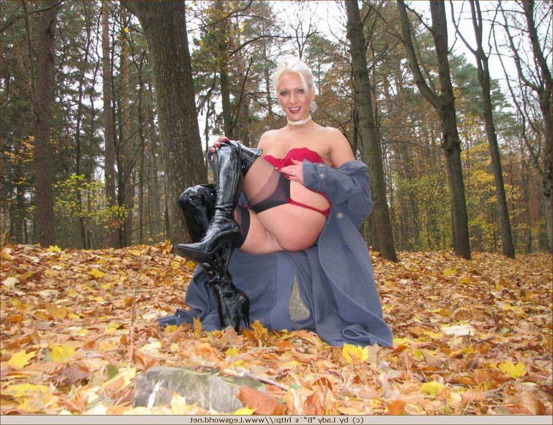 12P Blonde Ewa in stockings and high boots outdoors