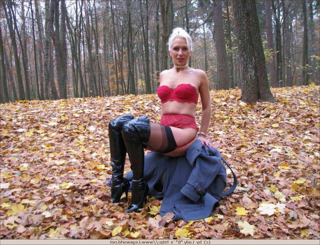 12P Blonde Ewa in stockings and high boots outdoors
