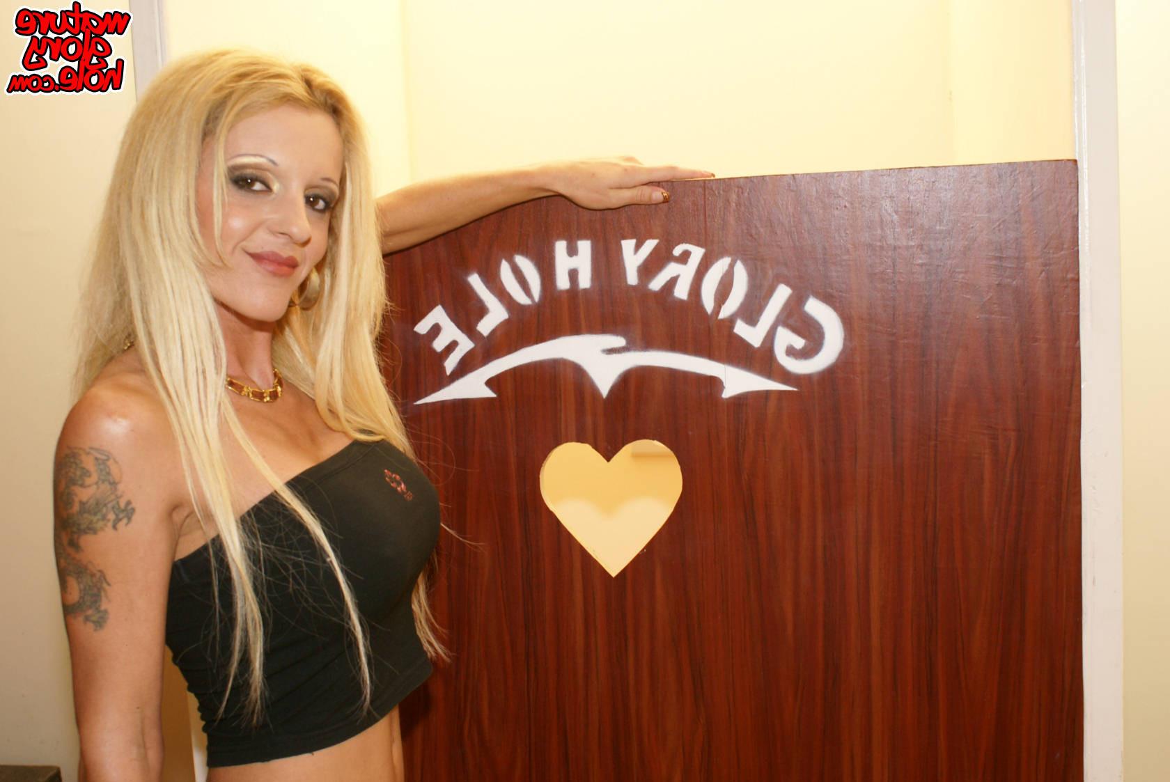 16P Hot MILF getting caught sucking through the gloryhole