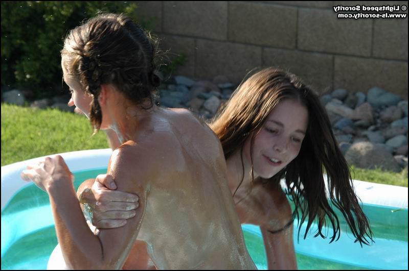 15P This naughty sorority girls wrestling in a pool of baby oil