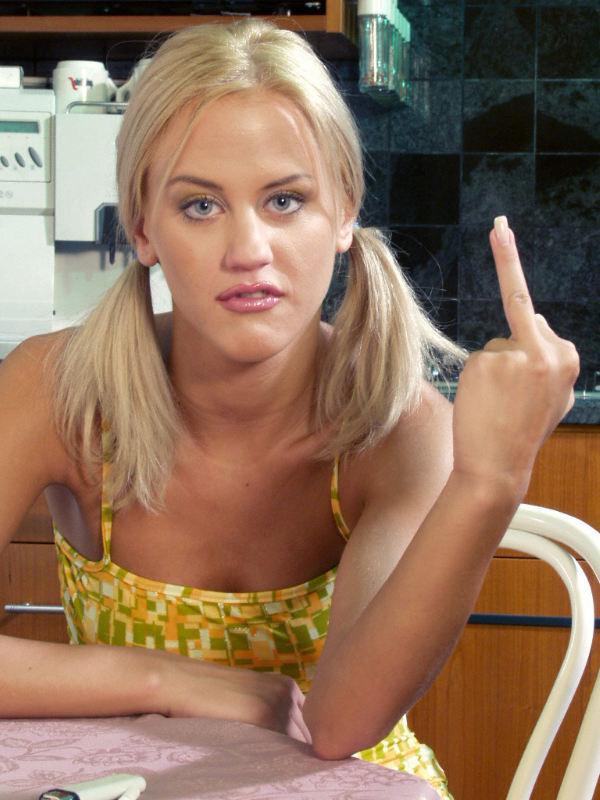 15P Pigtailed blondina smoking on table