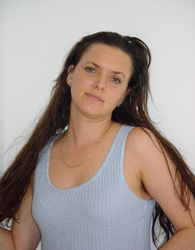 20P Nasty mature lady stuffing her hole