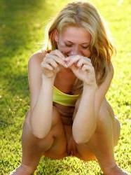 15P Sweet teen squats to pee in the grass