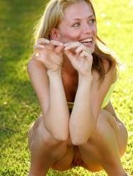 15P Sweet teen squats to pee in the grass