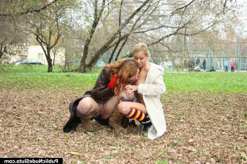 15P Couple of oversexed lesbians kissing and cuddling in the autumn park