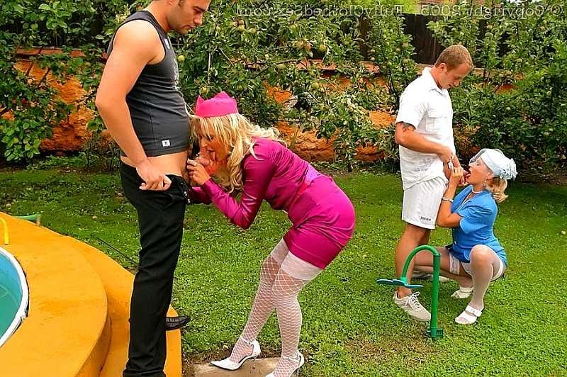 20P Two clothed blondes get fucked hard in the garden 