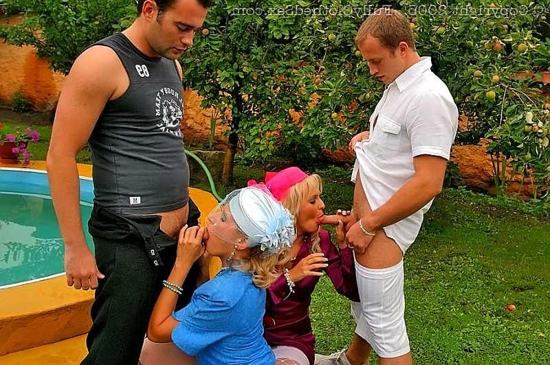 20P Two clothed blondes get fucked hard in the garden 