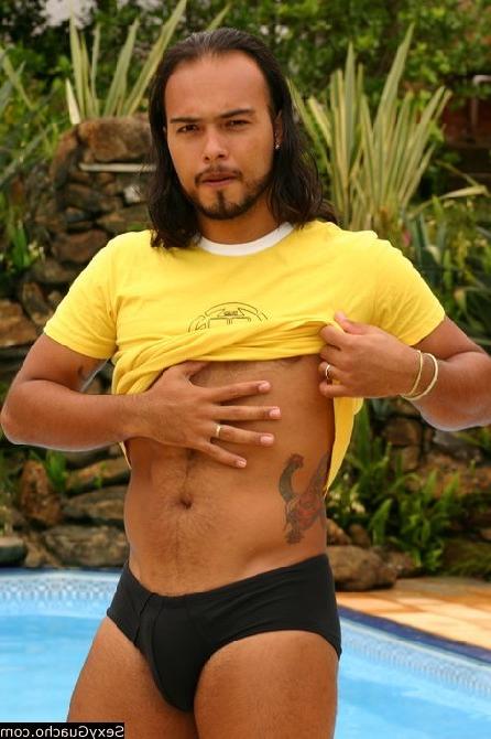 12P Horny bearded gay Latino man taking off his close showing off his meat
