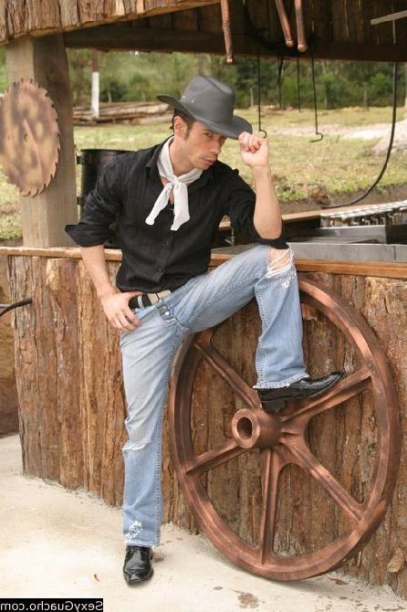 12P Cowboys cock dangling down at the ground while he looks into camera