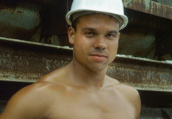 20P A latino muscle showing off at a deserted elevator