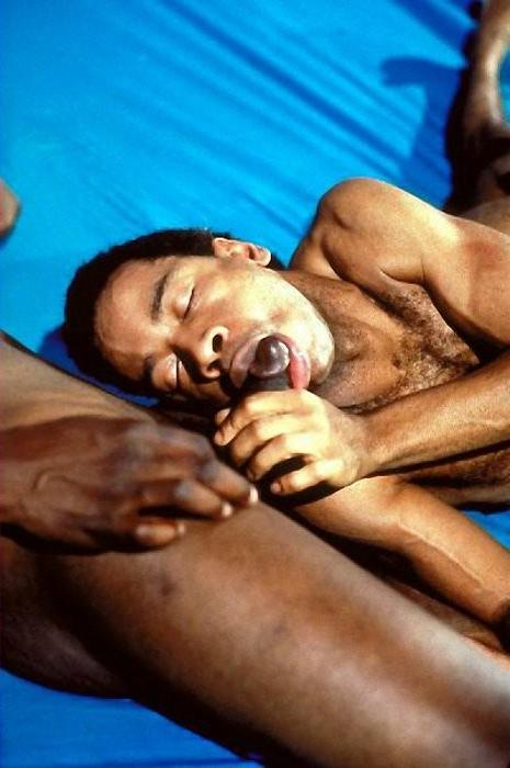 20P Huge crowd of smooth ebony muscle dudes having oral and anal fun