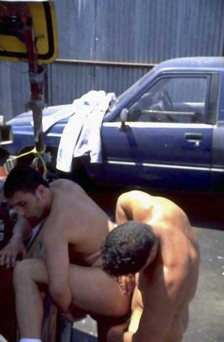 20P Two cute hunks enjoy mutual sucking and fucking on an auto dump