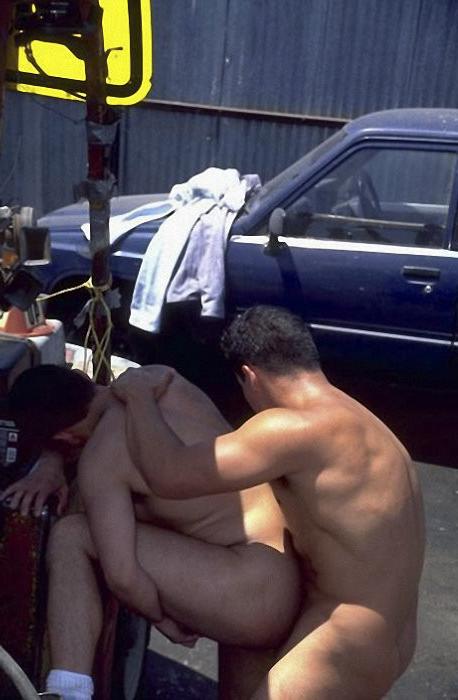 20P Two cute hunks enjoy mutual sucking and fucking on an auto dump