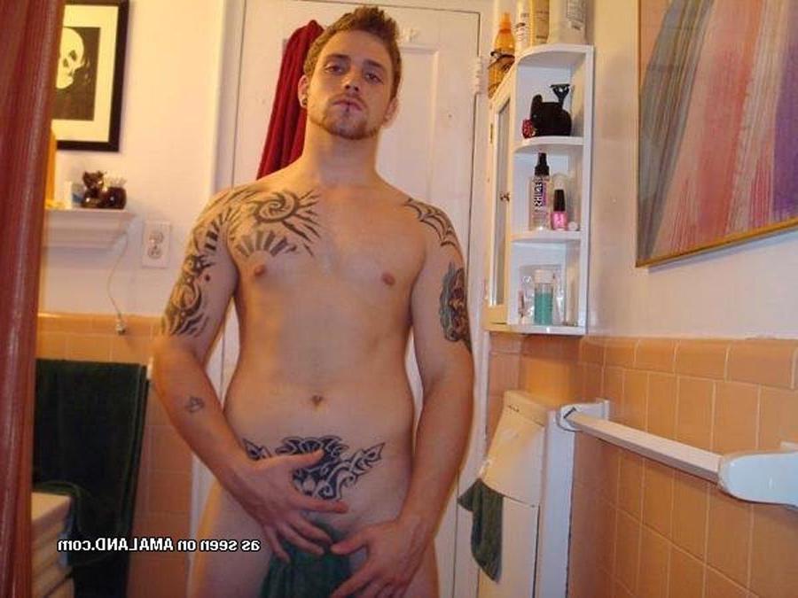 16P Tattooed stud shows off his stiff cock