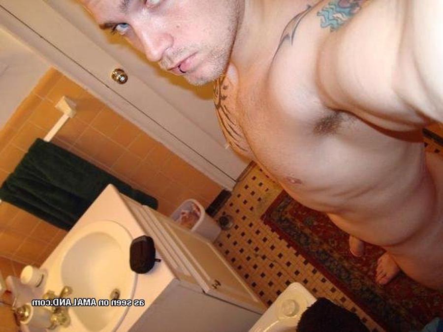 16P Tattooed stud shows off his stiff cock
