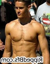 10P Topless guy is in the gym flexing up hard his muscles