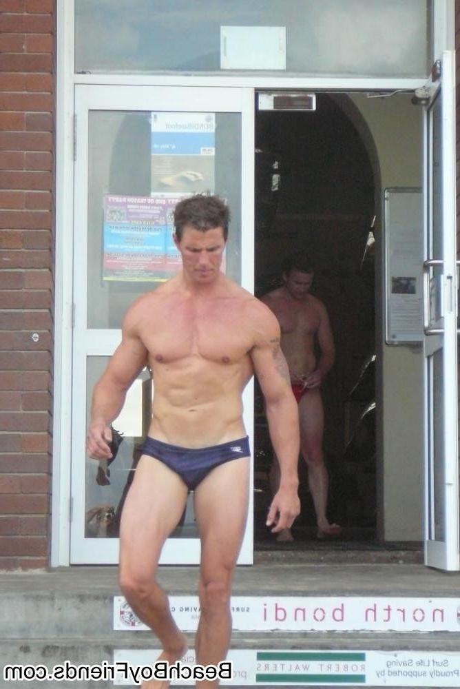 10P Big muscled dudes are wearing tight trunks at the beach