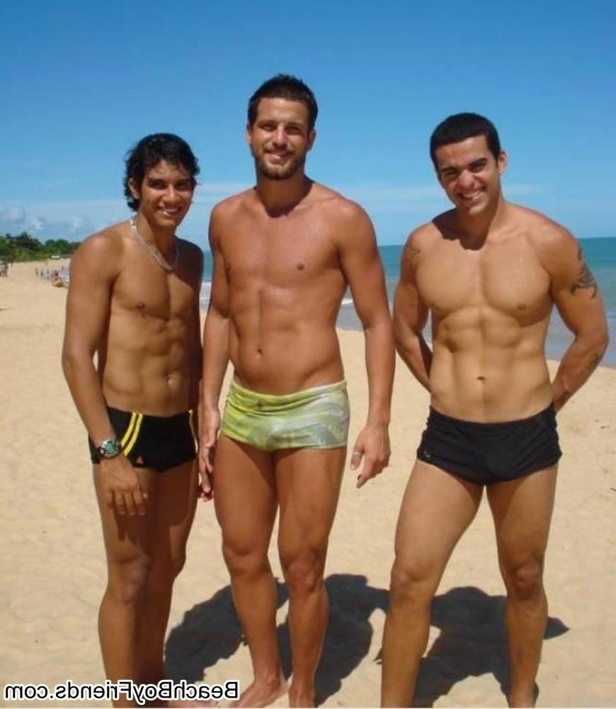 10P Big muscled dudes are wearing tight trunks at the beach