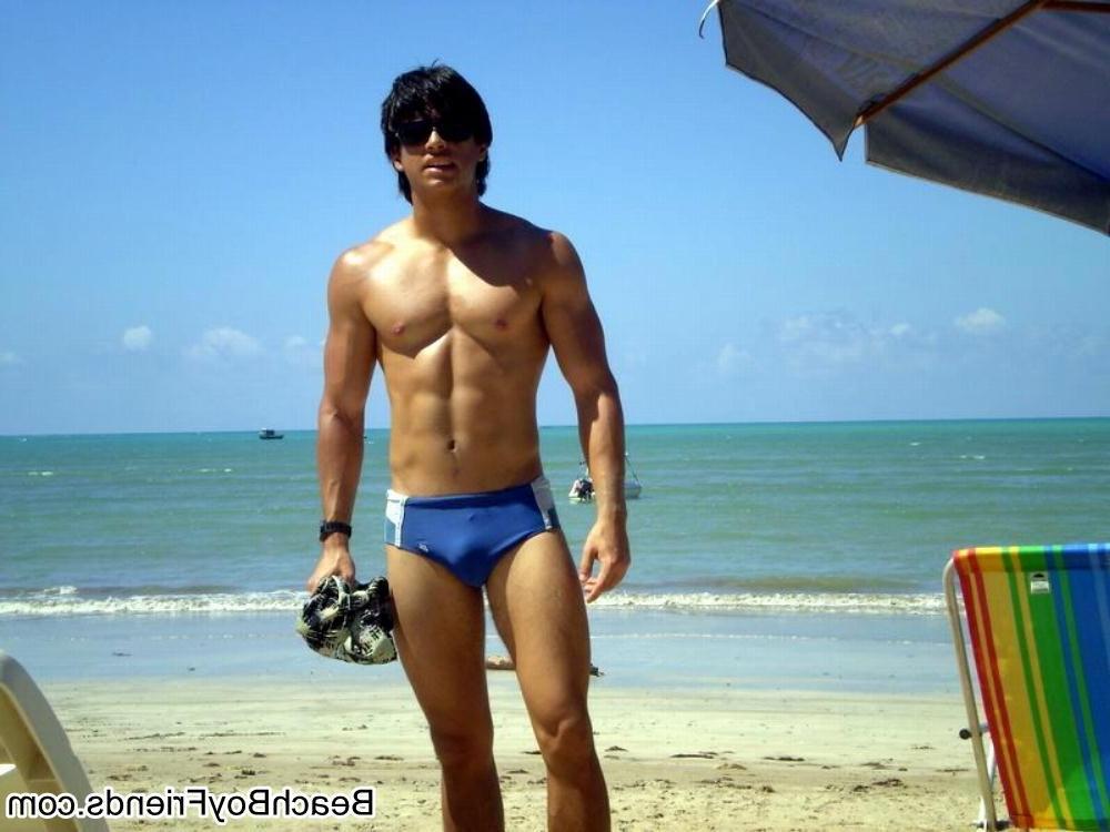 10P Big muscled dudes are wearing tight trunks at the beach