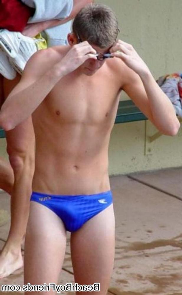 10P Big muscled dudes are wearing tight trunks at the beach