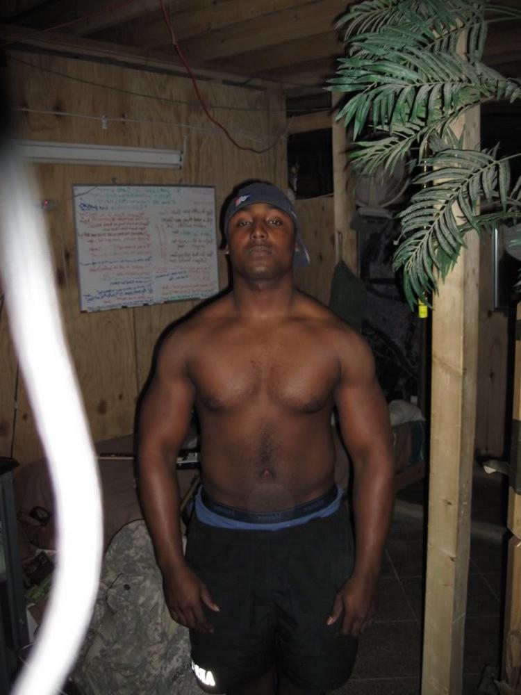 10P Black hunk lays down on the floor and quickly strokes cock
