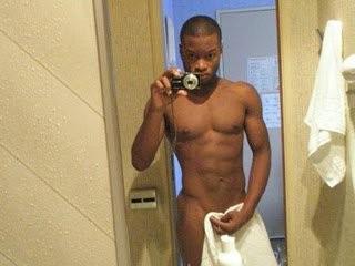 10P Black hunk lays down on the floor and quickly strokes cock