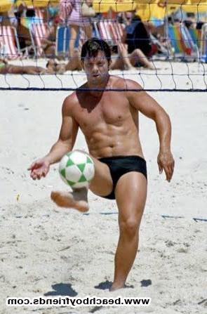 10P Good looking dudes are topless at the beach showing some abs
