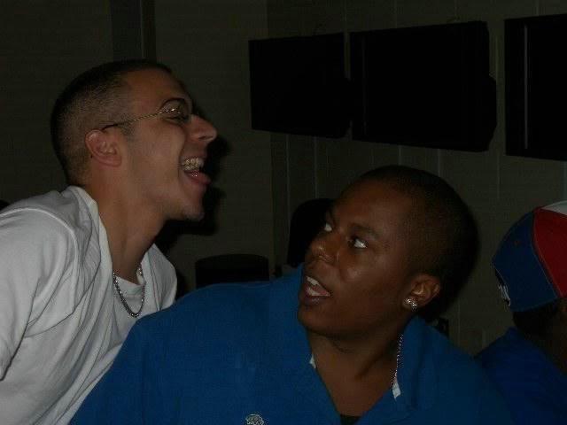 10P Two black dudes are having fun wrestling on the bed