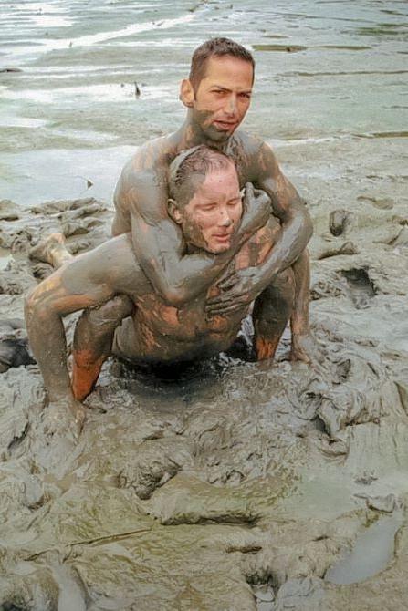 20P Muscle couple outdoor wrestling and thrusting the liquid mud