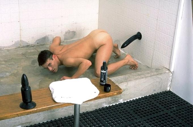 20P Tanned stud enjoys showing off and self didloing in a shower